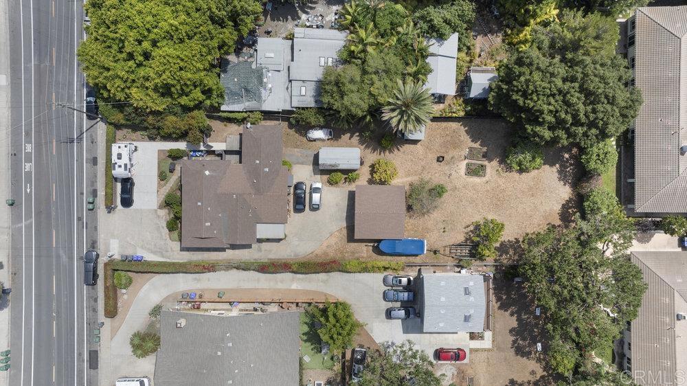 an aerial view of a house with outdoor space