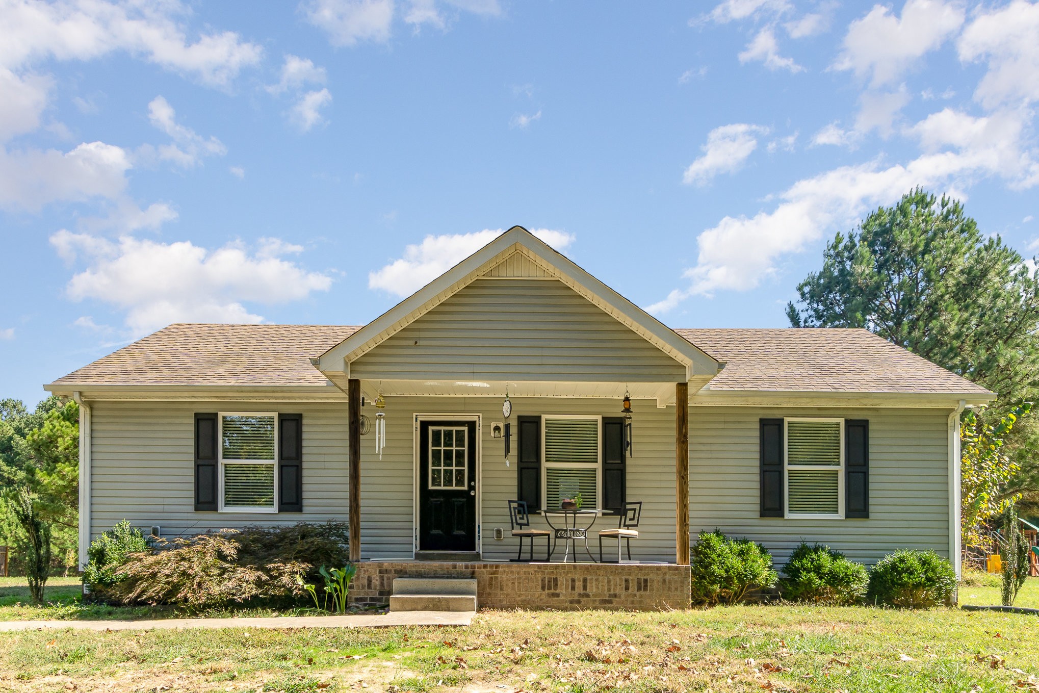 front view of a house with a yard