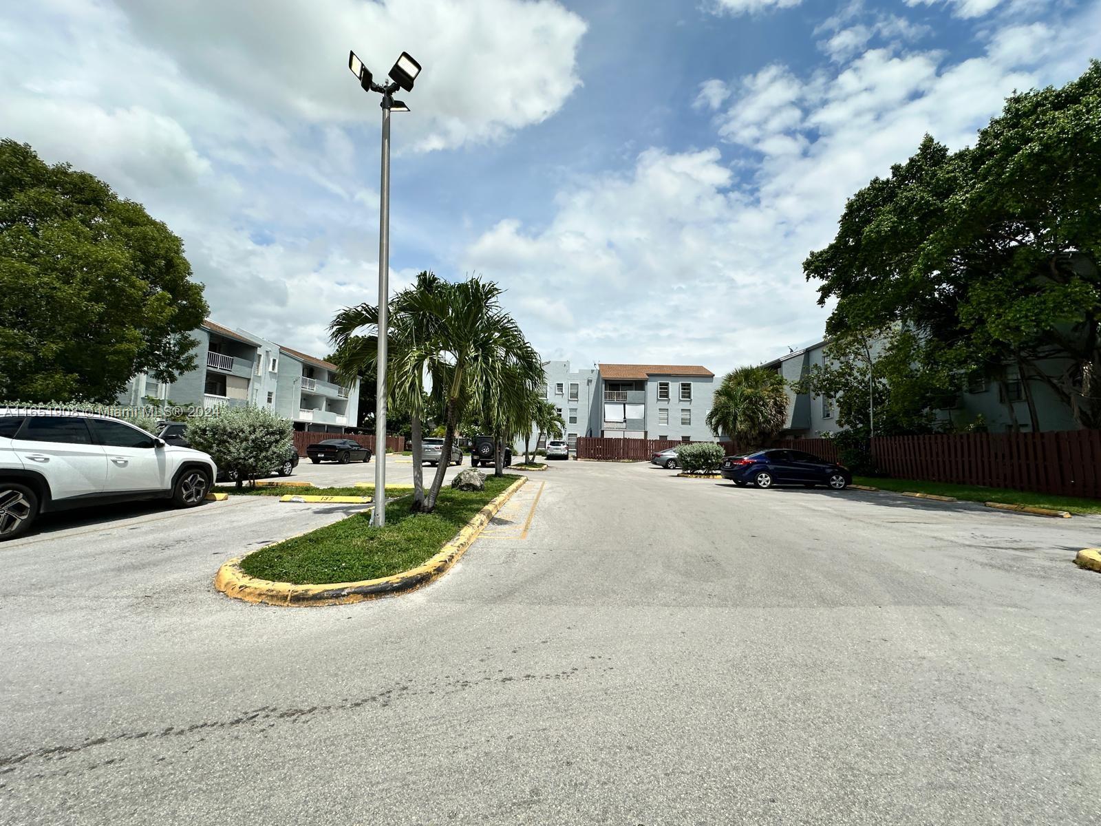 a view of a street with a building