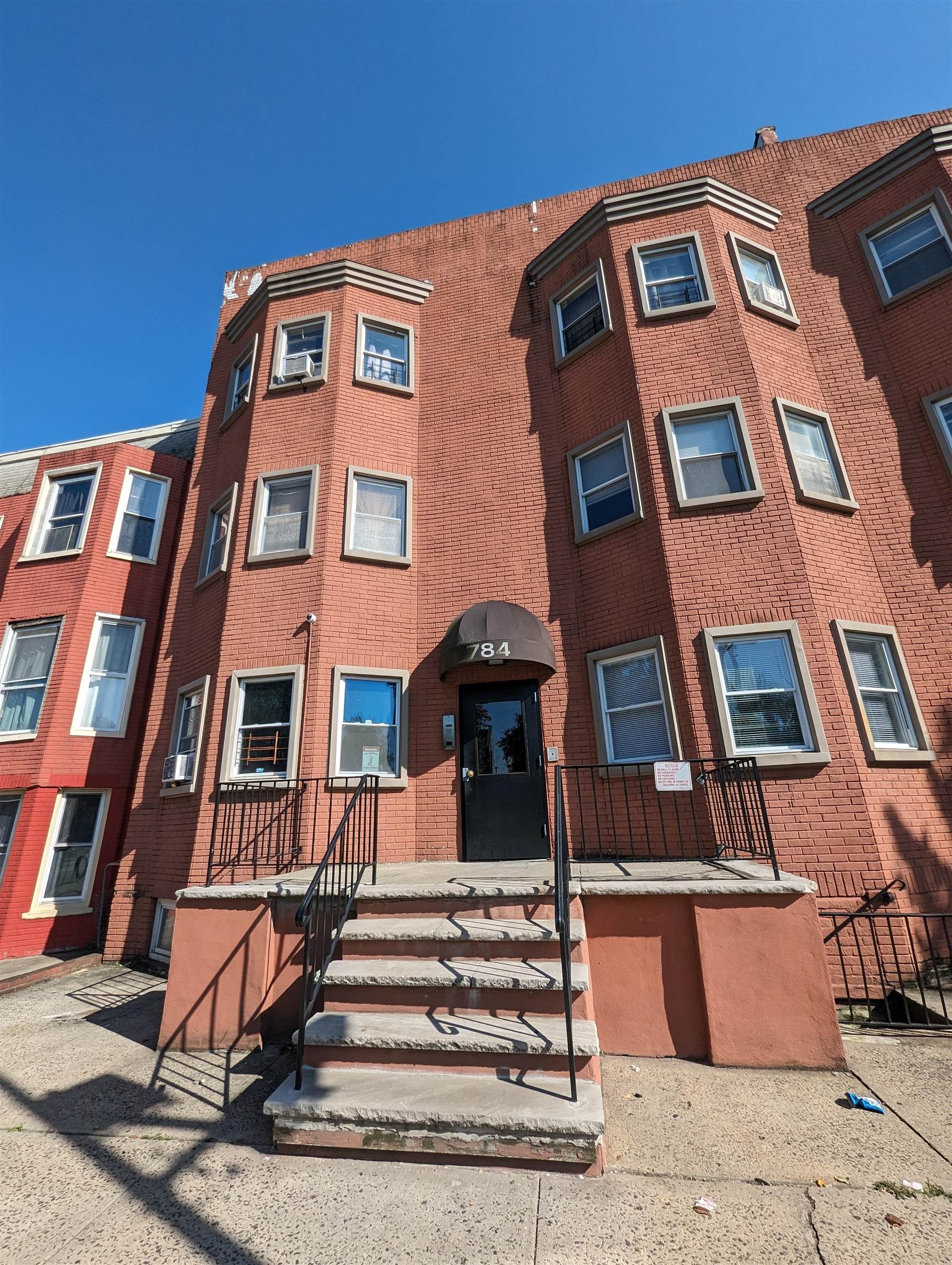 a front view of a multi story residential apartment building