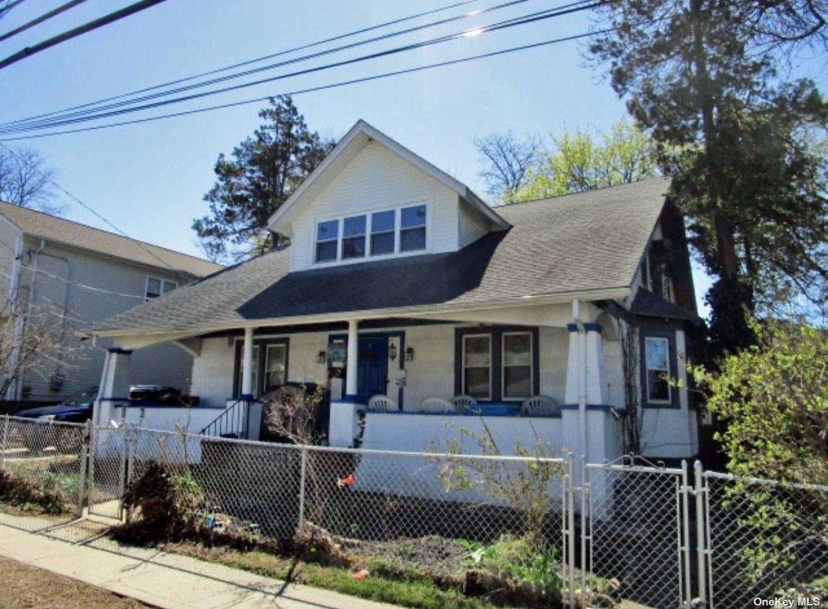 a front view of a house with a porch