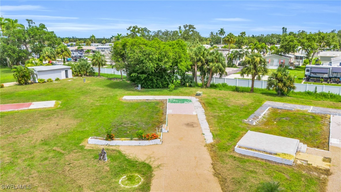 a view of a garden with houses