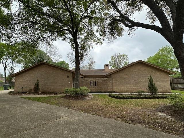 a house with trees in the background