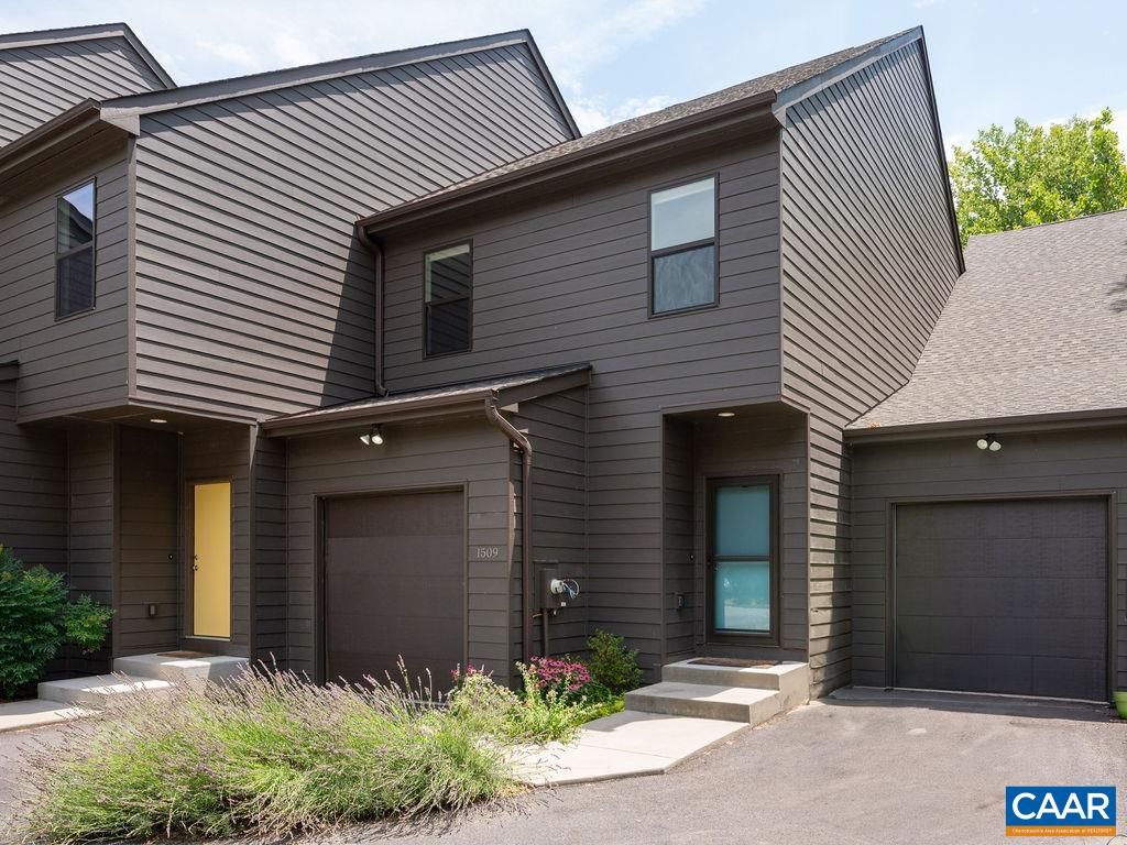 a front view of a house with a garage