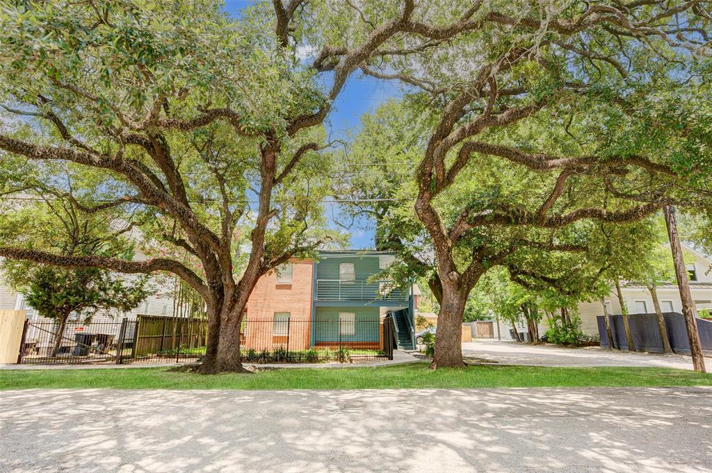 front view of a building with trees