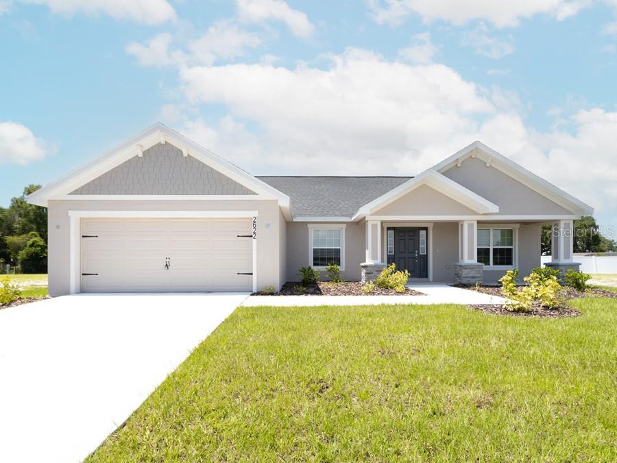 a front view of a house with patio