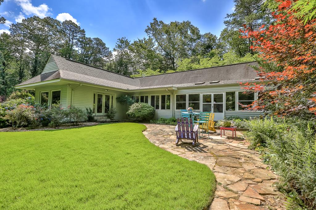 a house view with a garden space