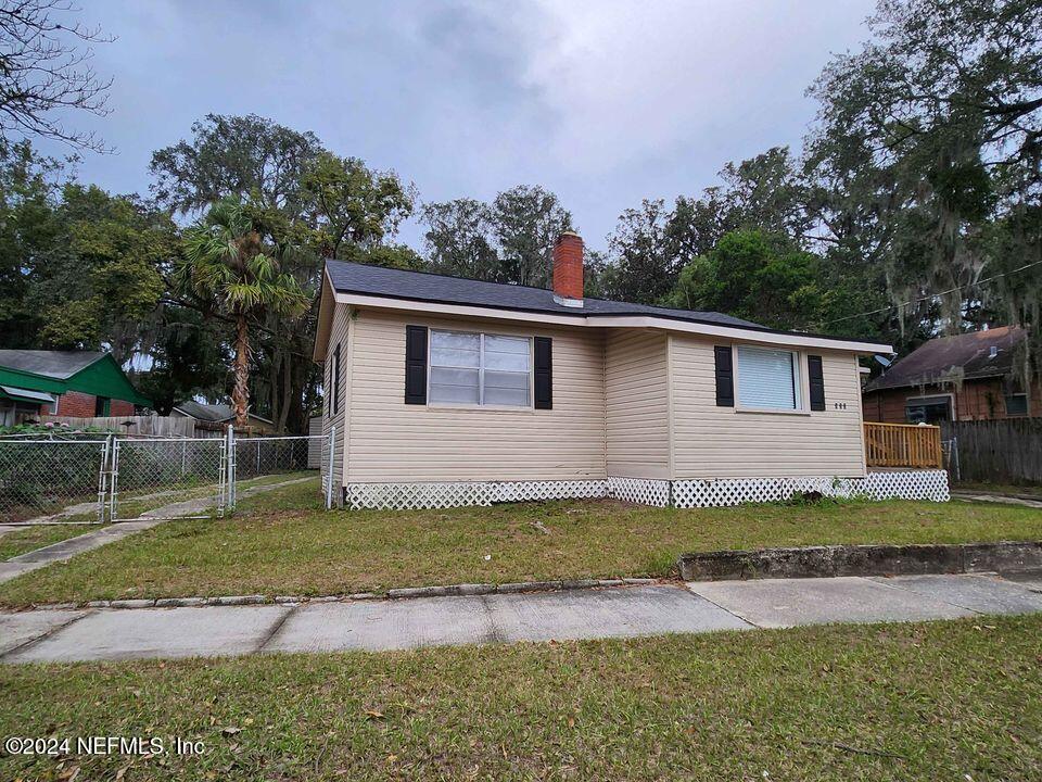 front view of a house with a yard