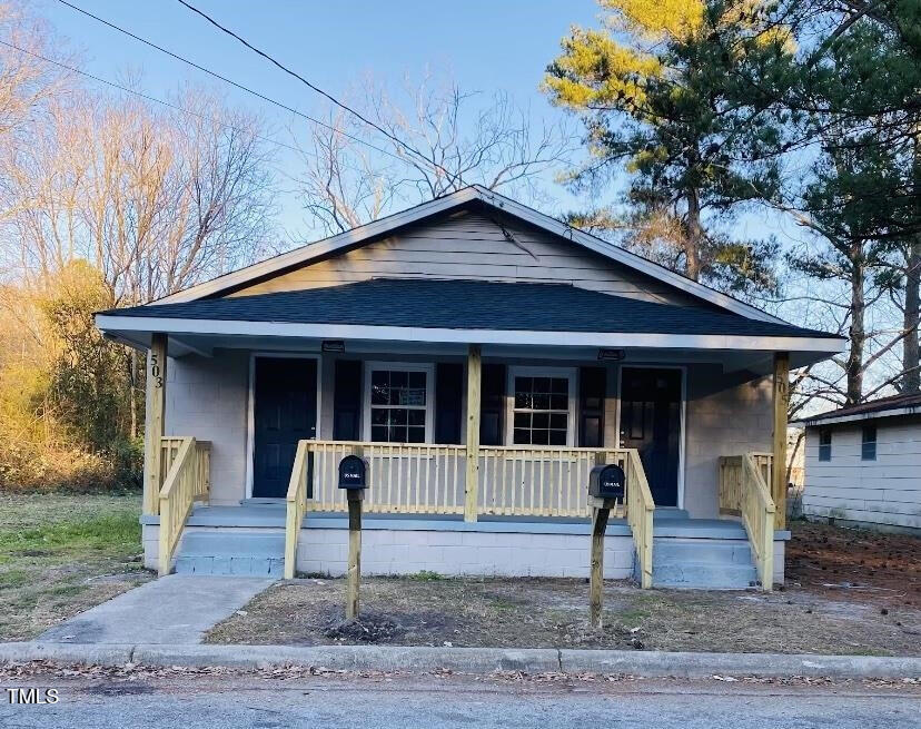 a front view of a house with porch