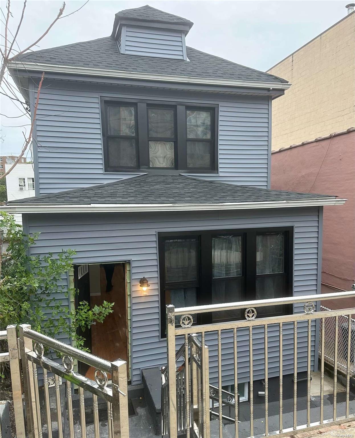 a view of front door and deck