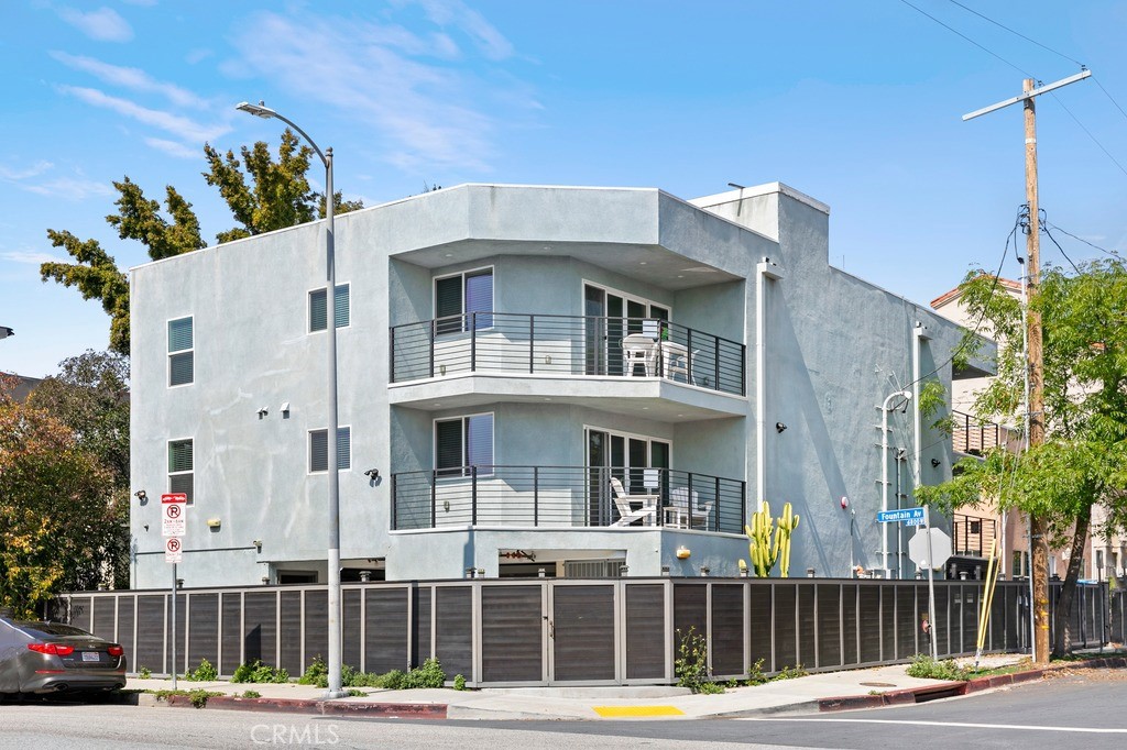 a front view of a building with street view