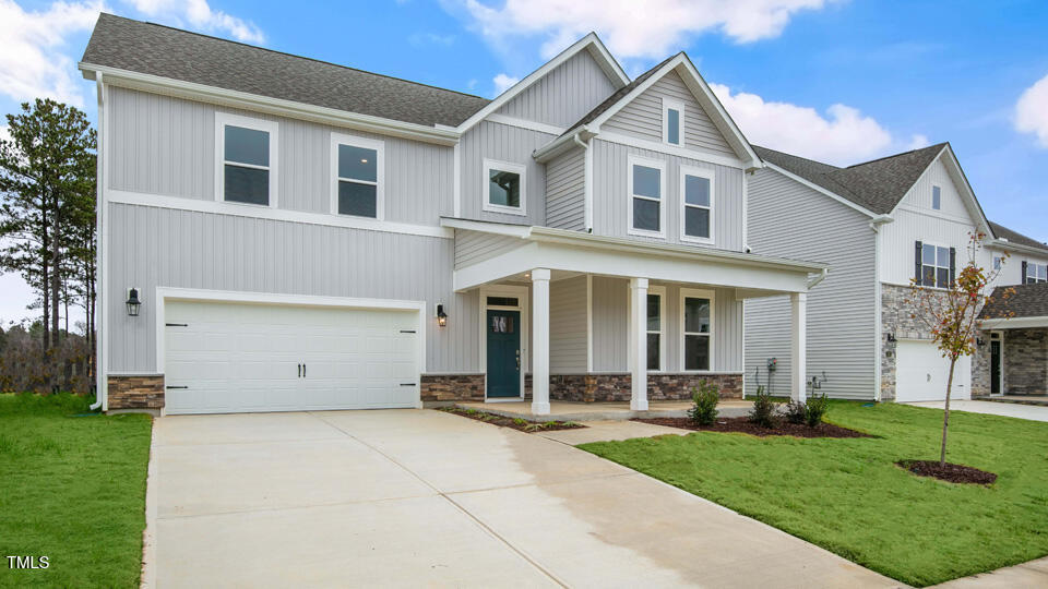 a front view of house with yard