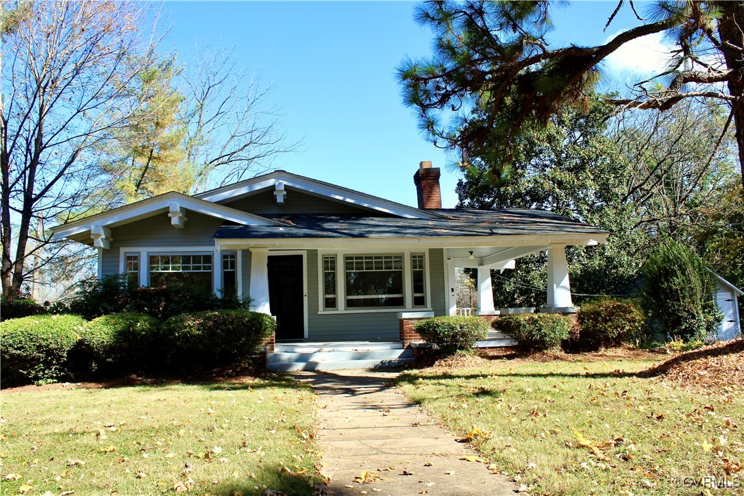 front view of a house with a yard