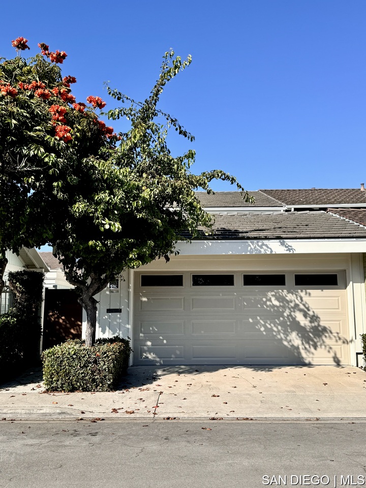 a view of a house with a street