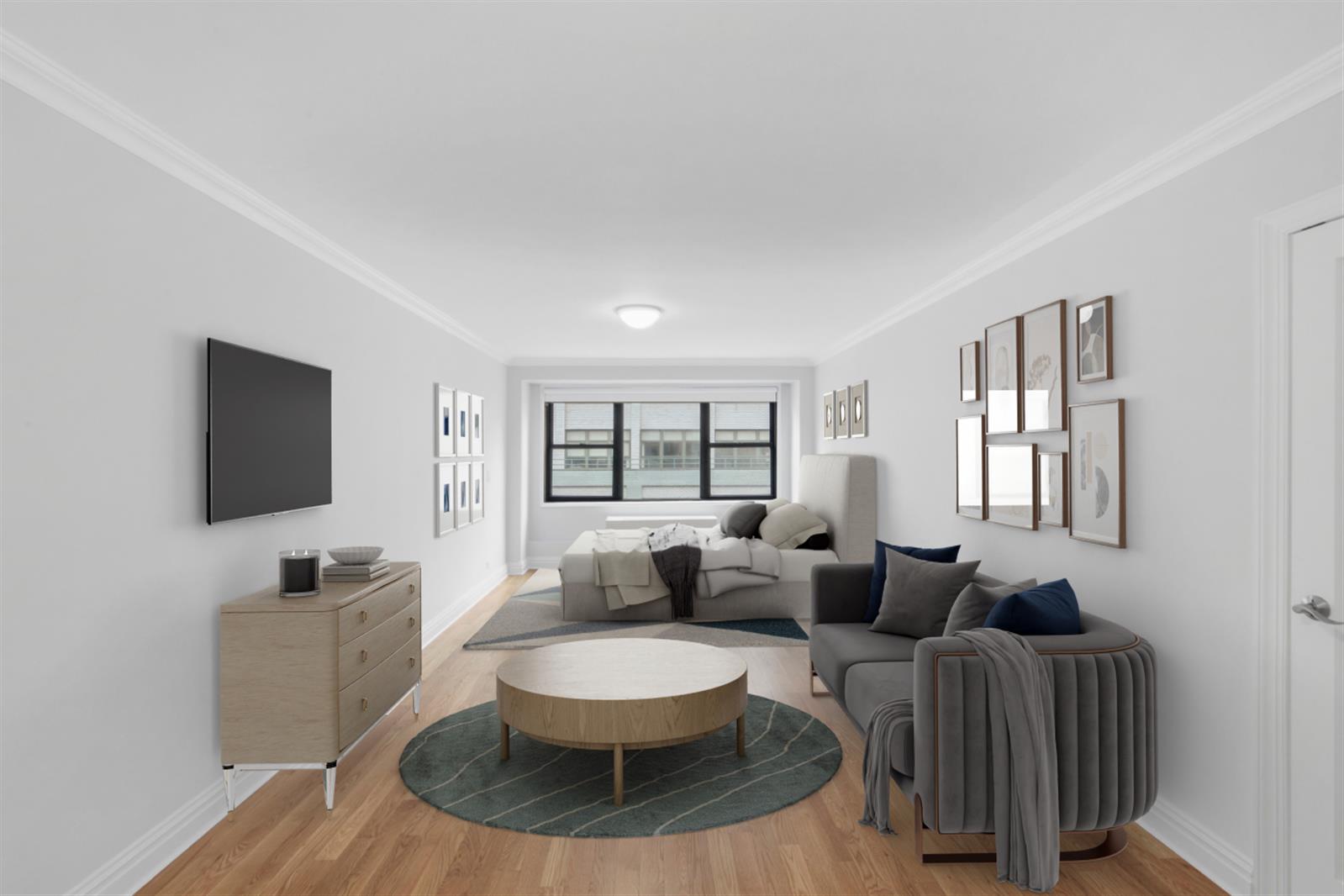 a living room with furniture a flat screen tv and a window