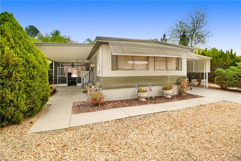 a front view of a house with a pathway