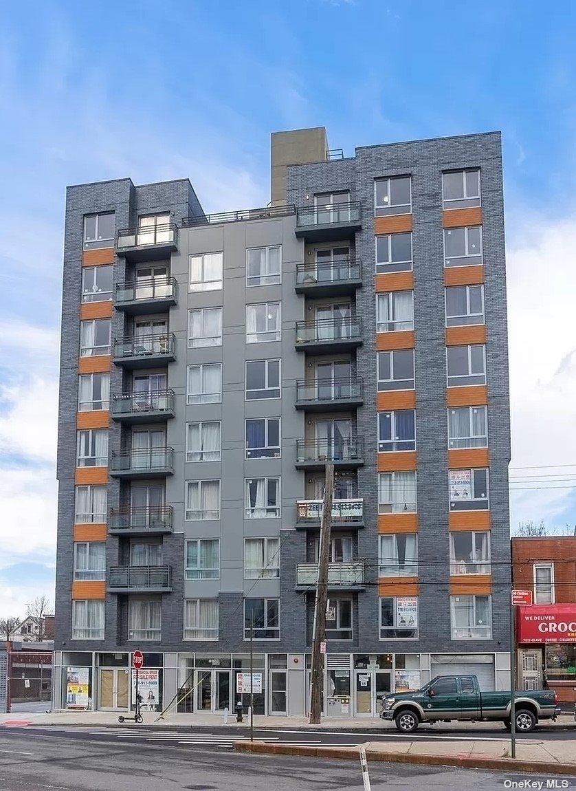 a front view of a building with lot of windows