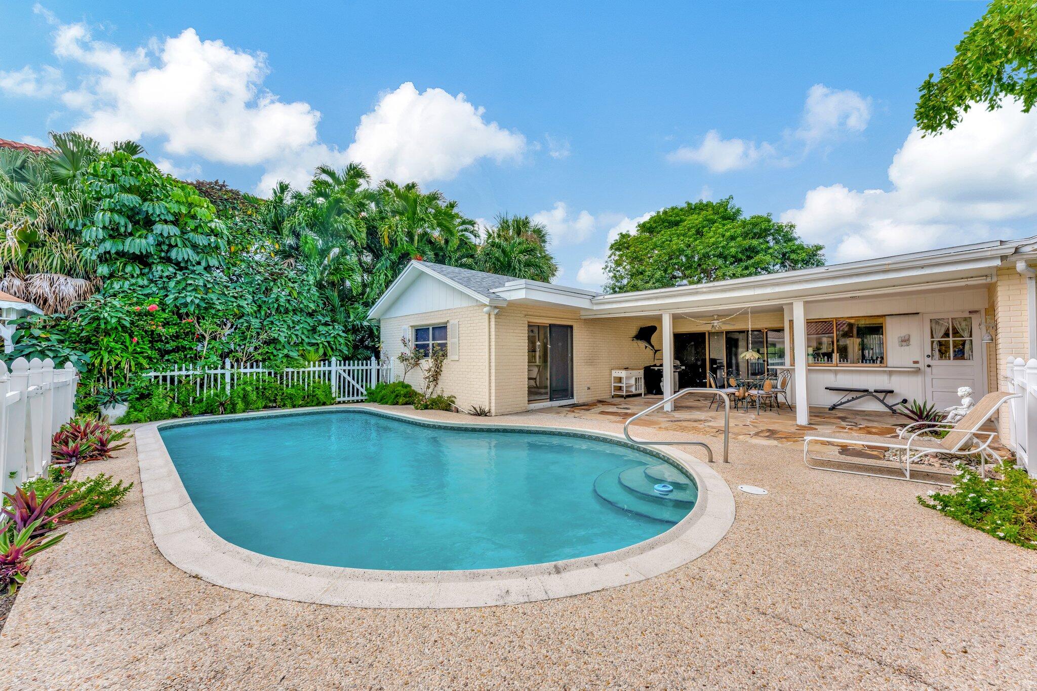 a view of outdoor space yard swimming pool and patio