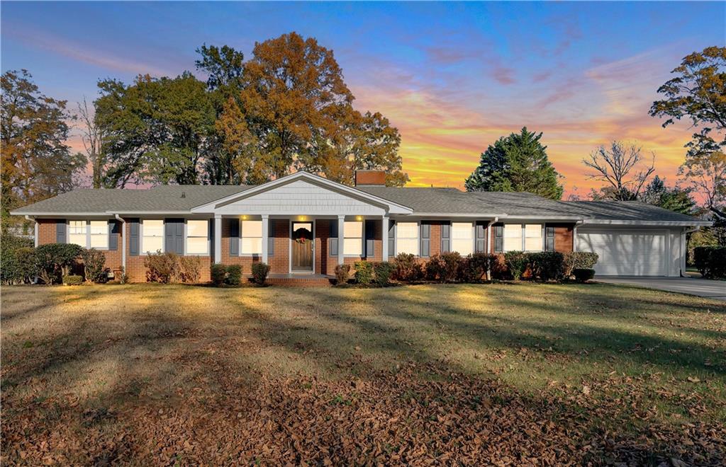 a front view of a house and a yard