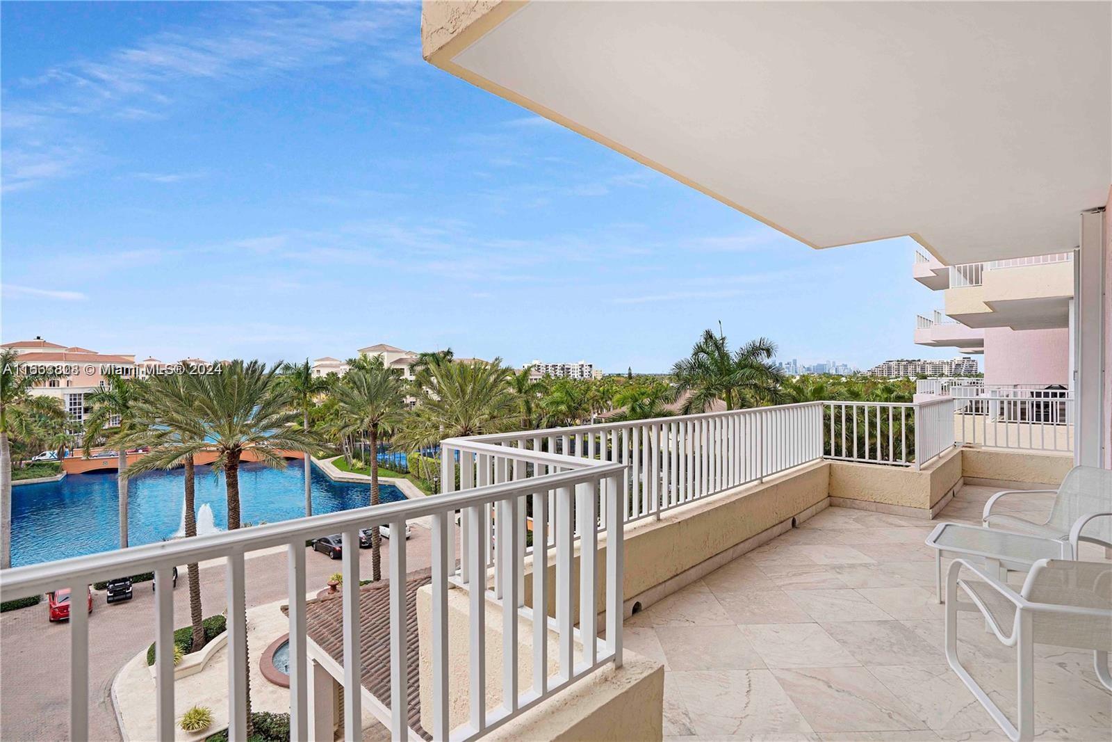 a view of balcony with furniture