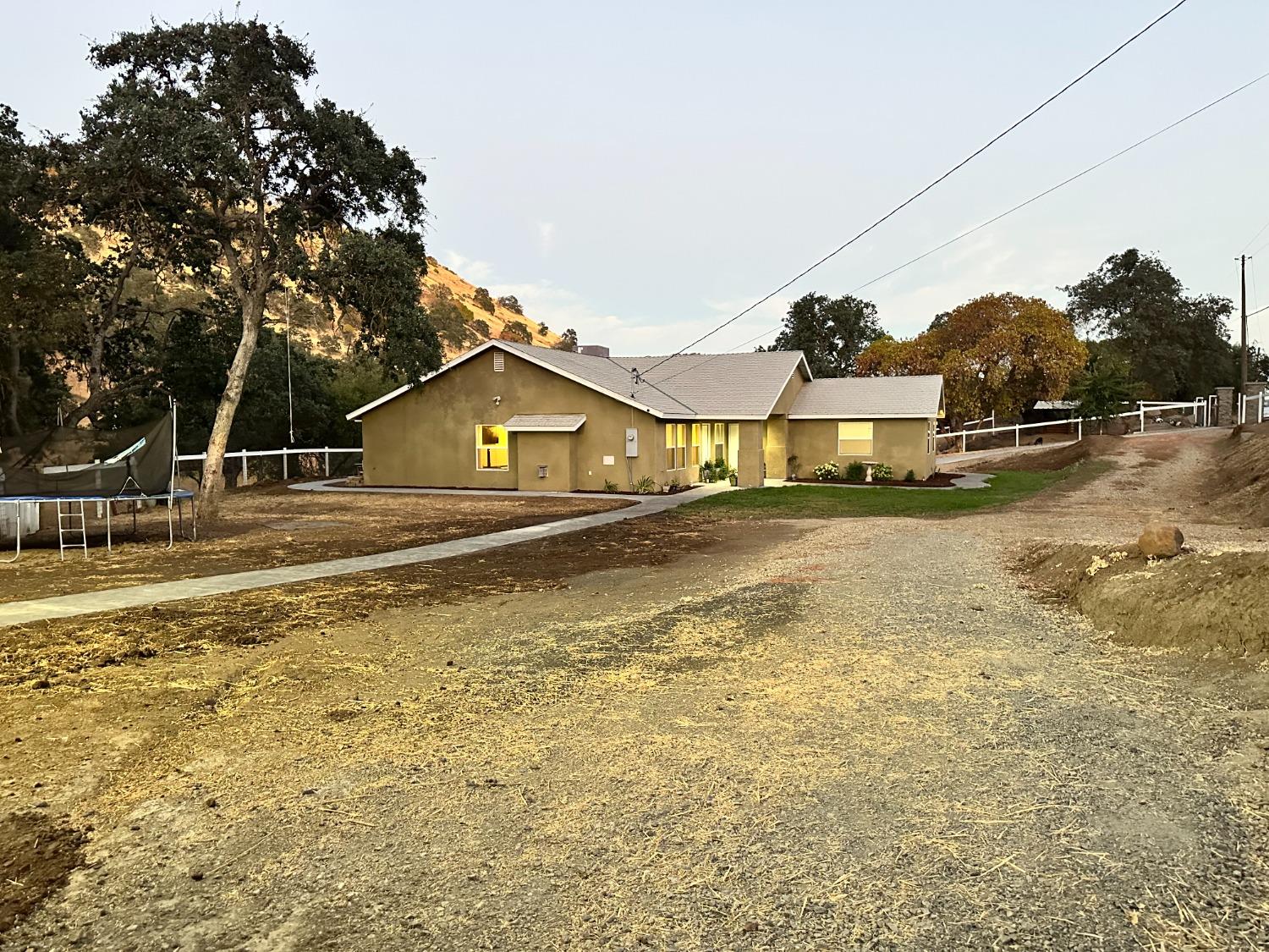 a view of a house with a swimming pool