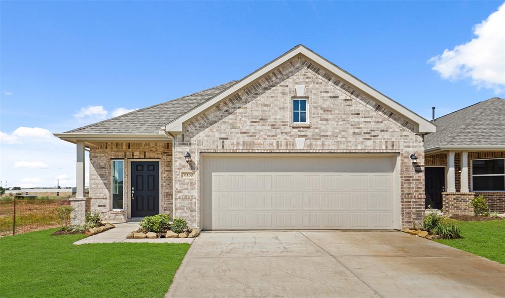 Stunning Leopold home design with elevation A by K. Hovnanian Homes in the quaint community of Bluebonnet Village.