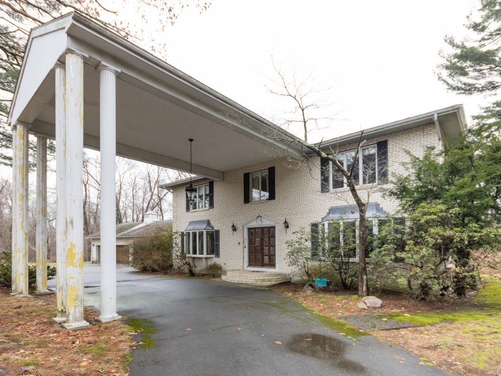 a view of a house with a patio