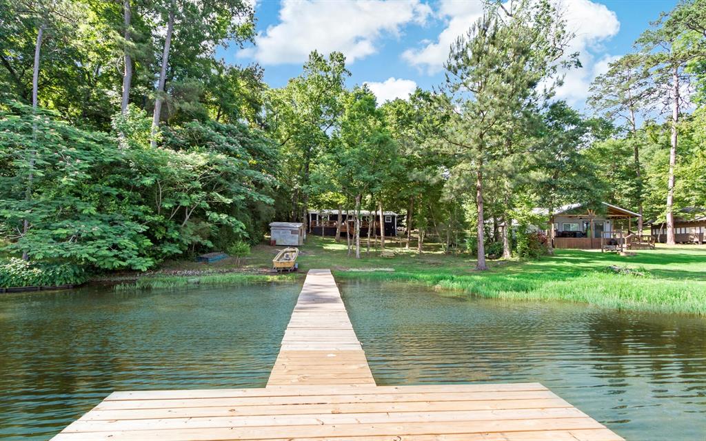 a view of a lake with a garden