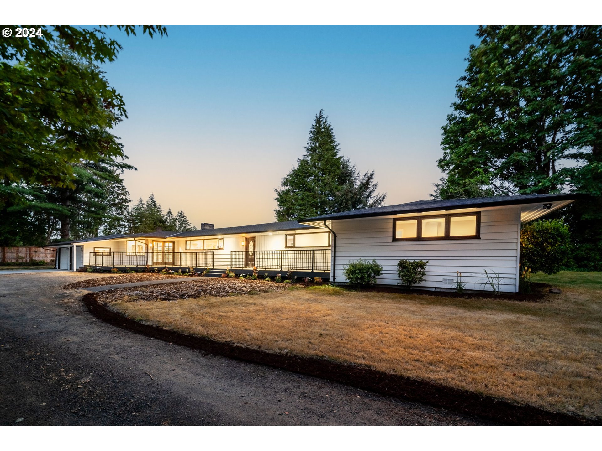 a view of a house with a big yard