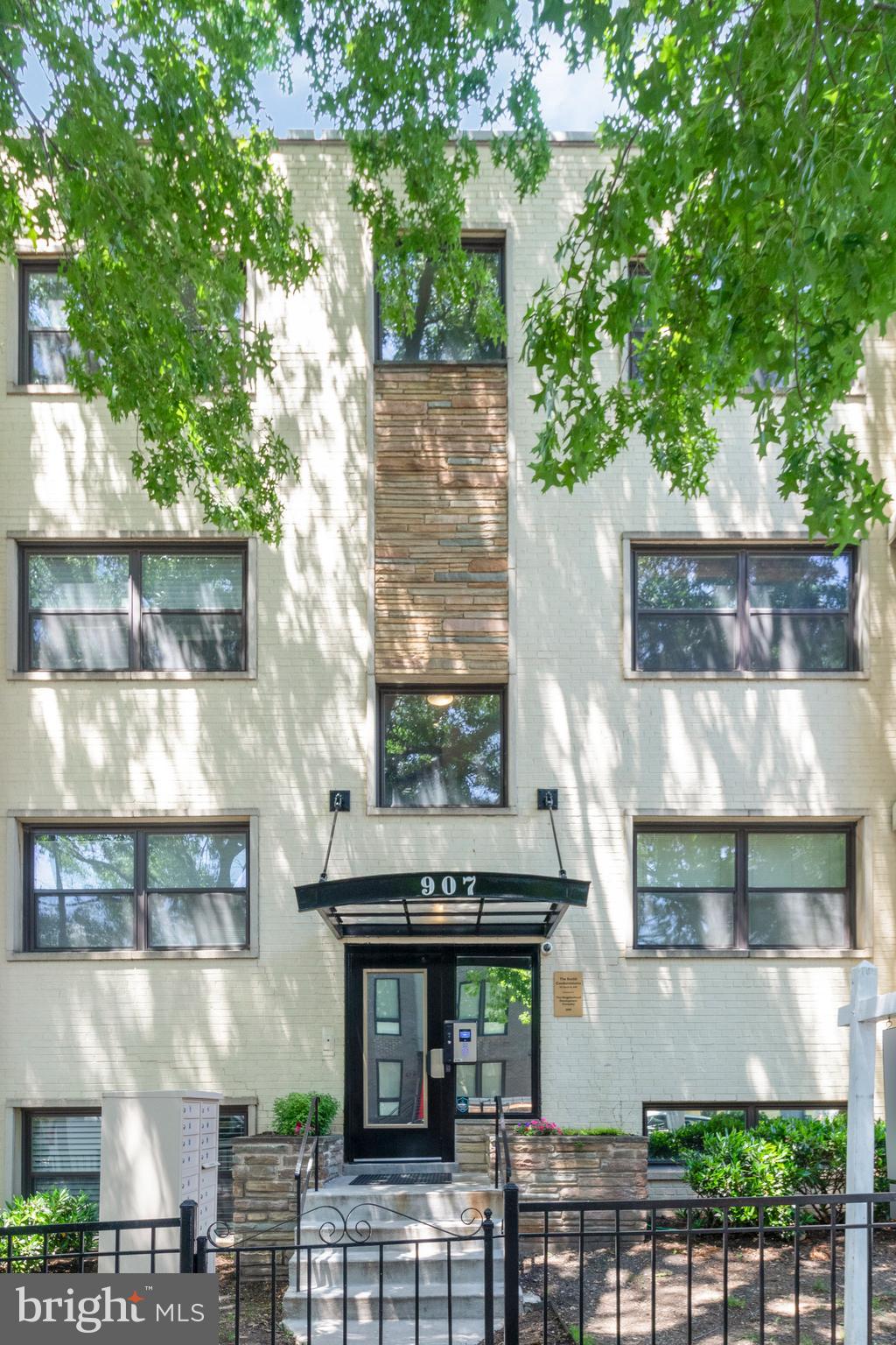 a front view of a building with balcony