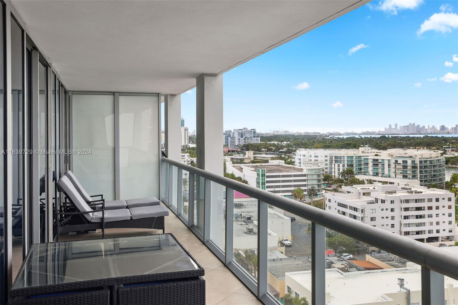 a view of a balcony with city view