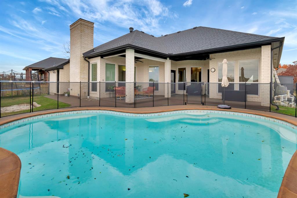 a front view of house with outdoor seating