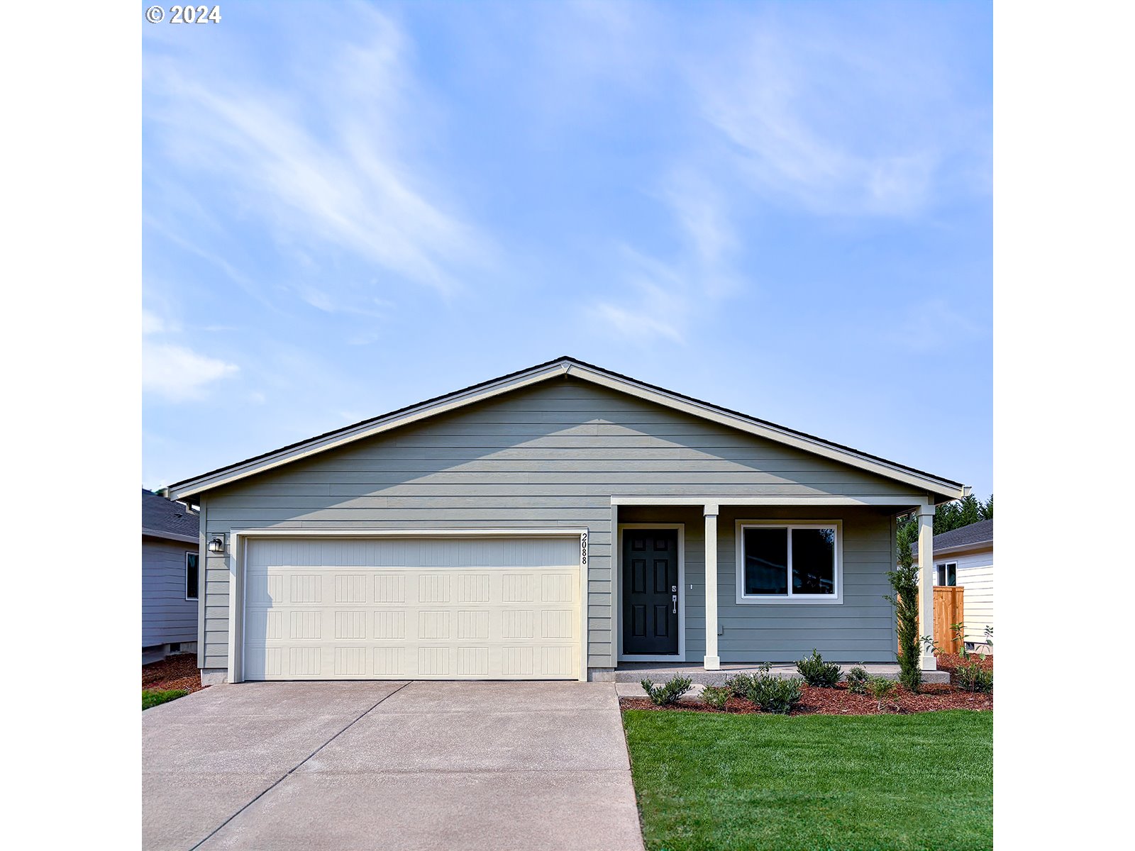 a front view of house with yard