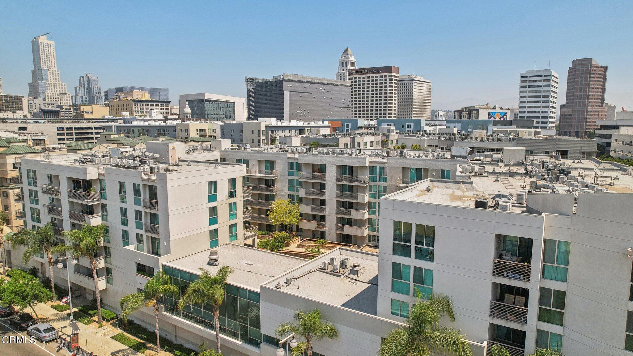 a view of city with tall buildings