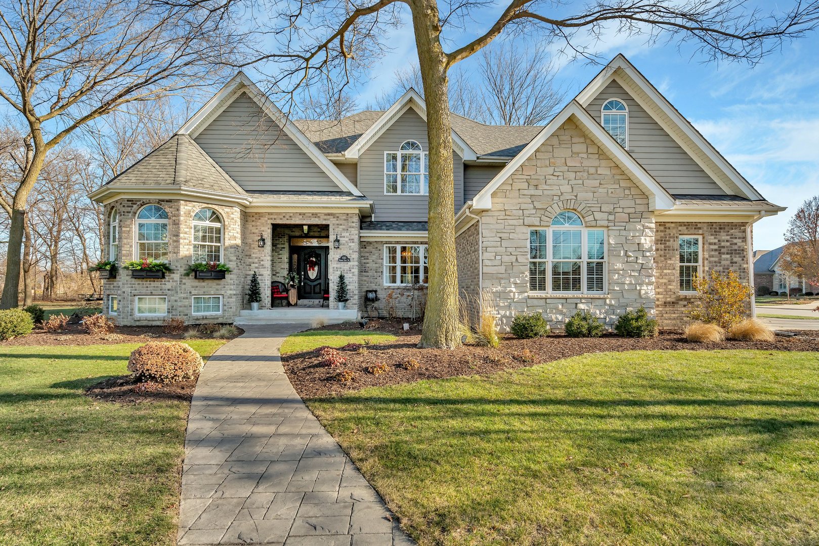 a front view of a house with swimming pool