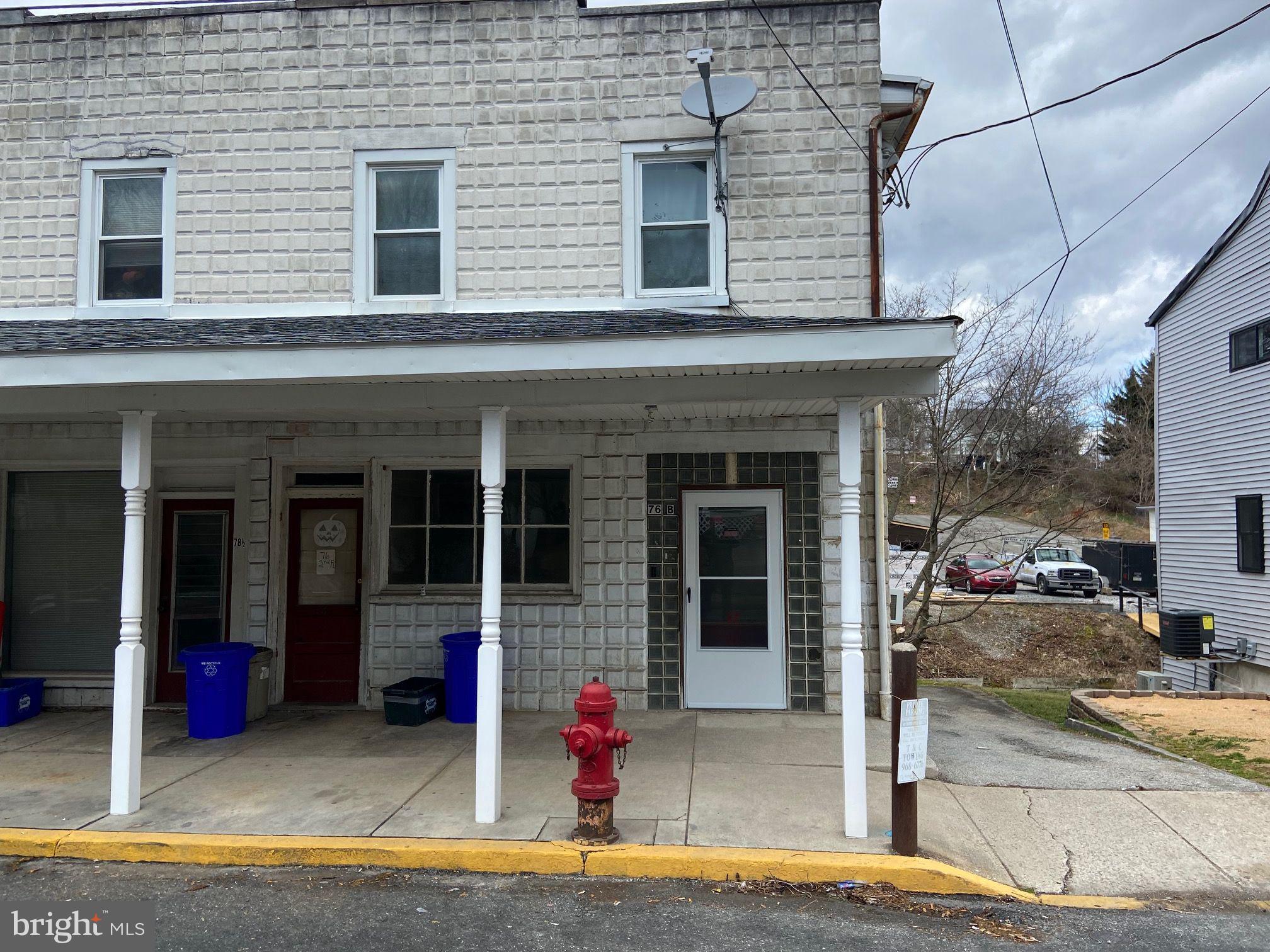 a view of a house with a patio