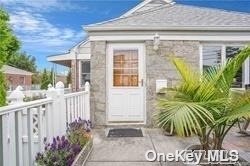 a view of a potted plants in front of a house