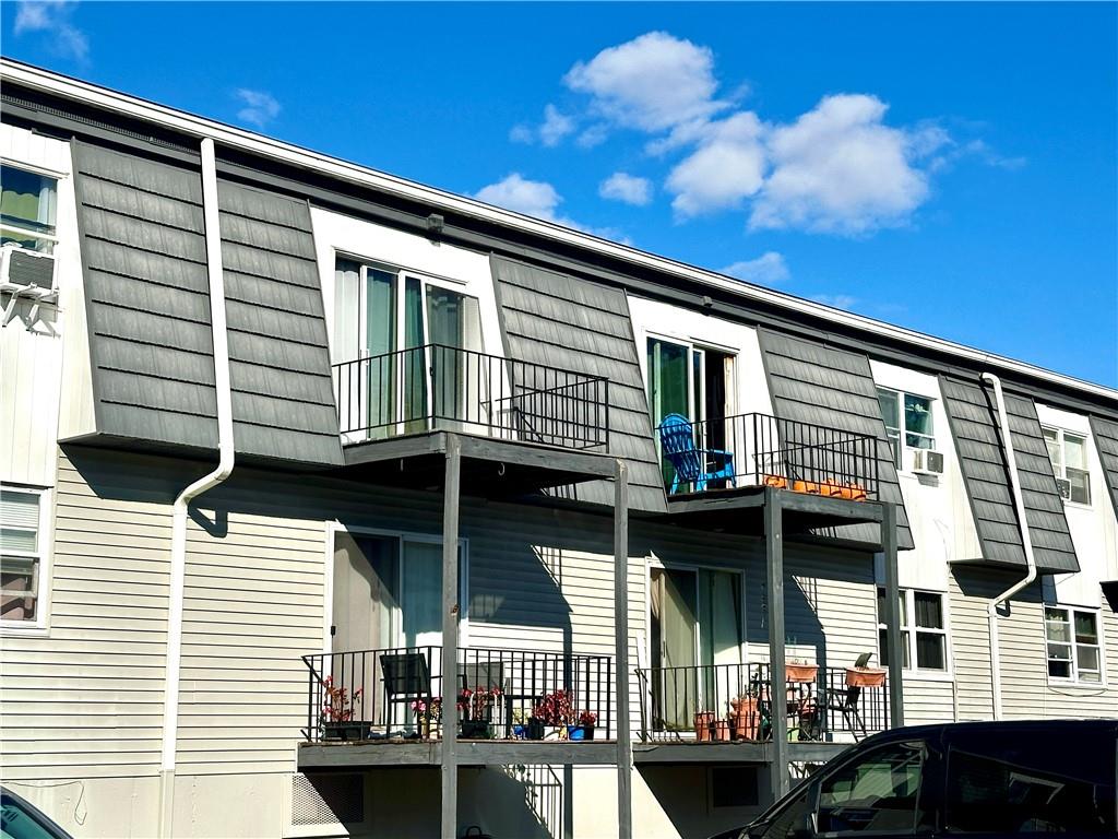 a front view of a house with balcony