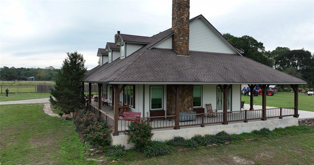 a house view with a garden space and garden