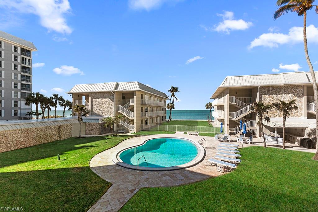 a view of a house with a swimming pool