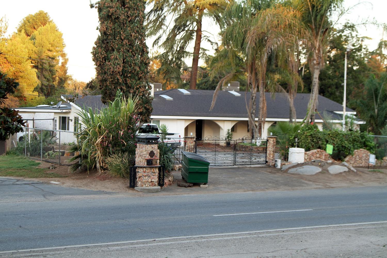 a view of a house with a street