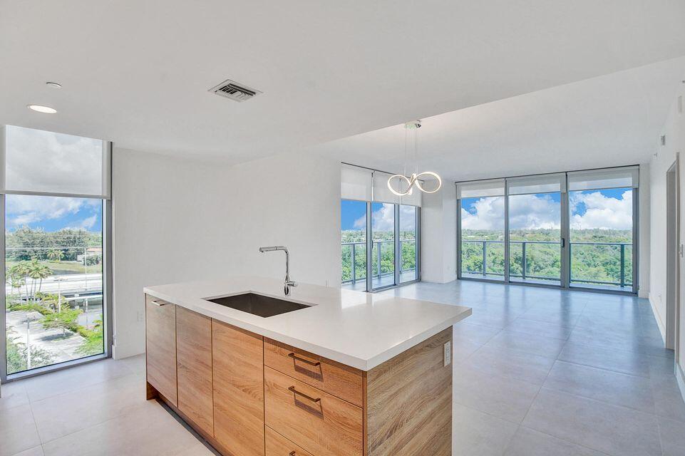 a kitchen with counter top and yard