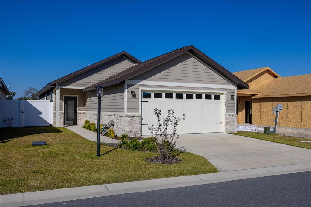 front view of a house with yard