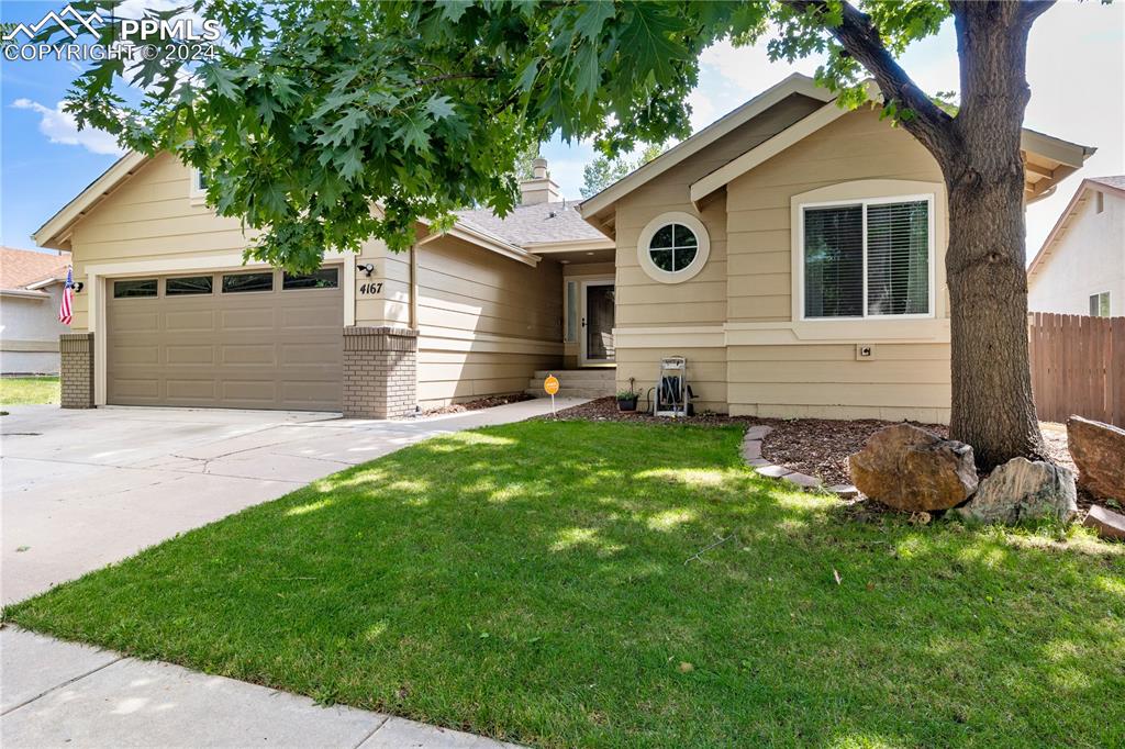 a front view of house with yard