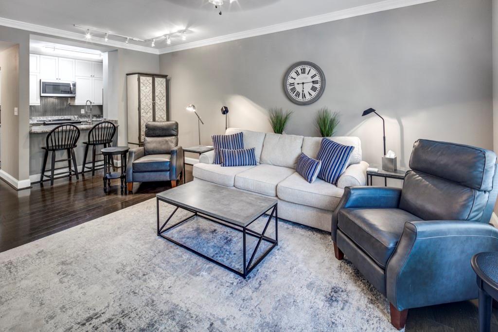 a living room with furniture and a table