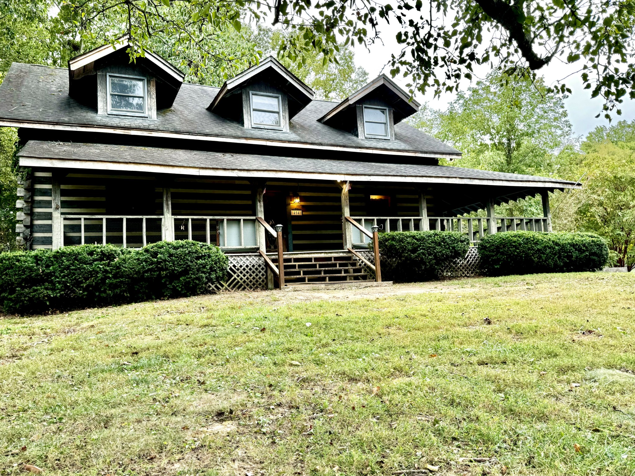 a house view with a garden space