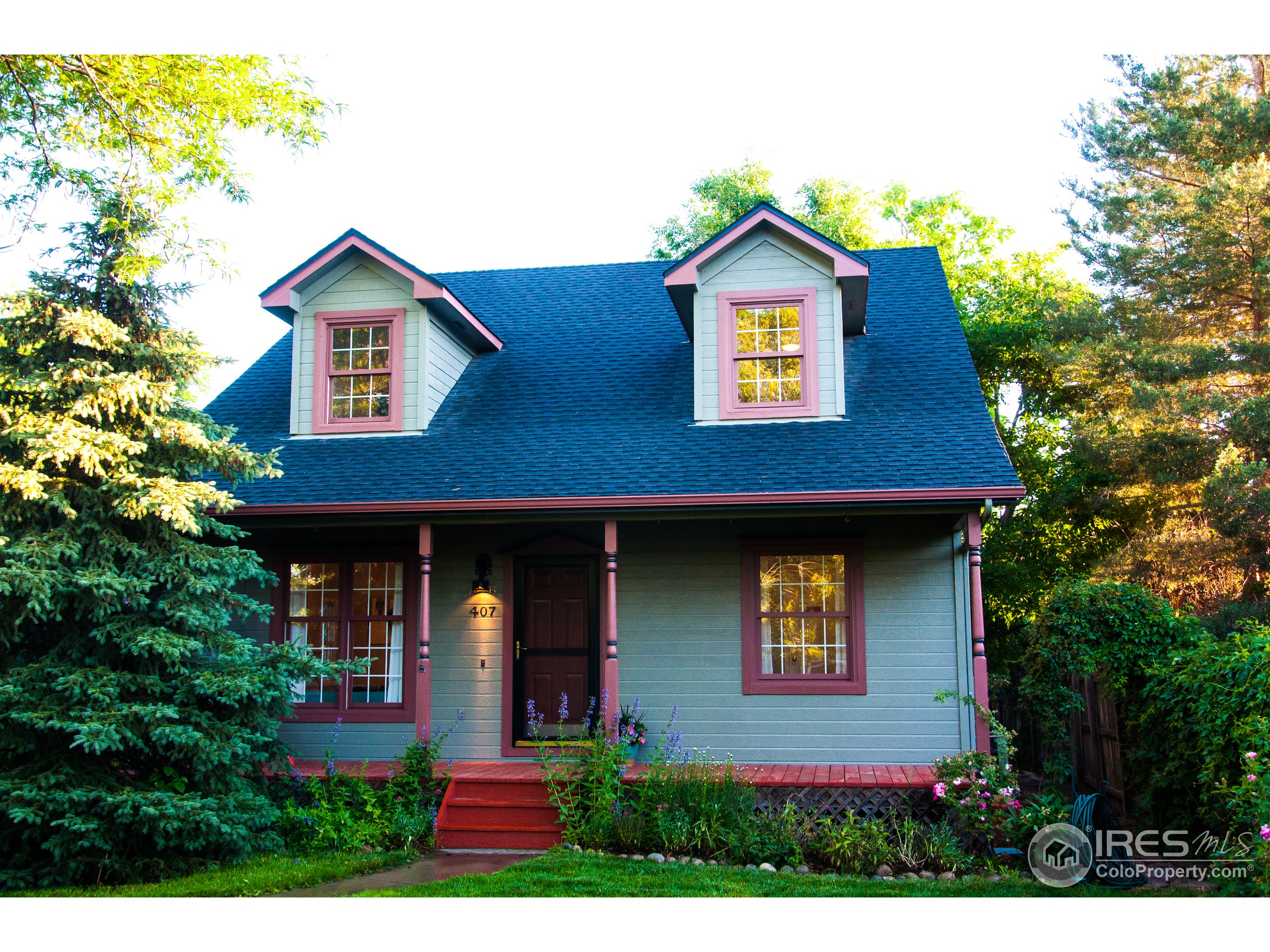 a front view of a house with yard