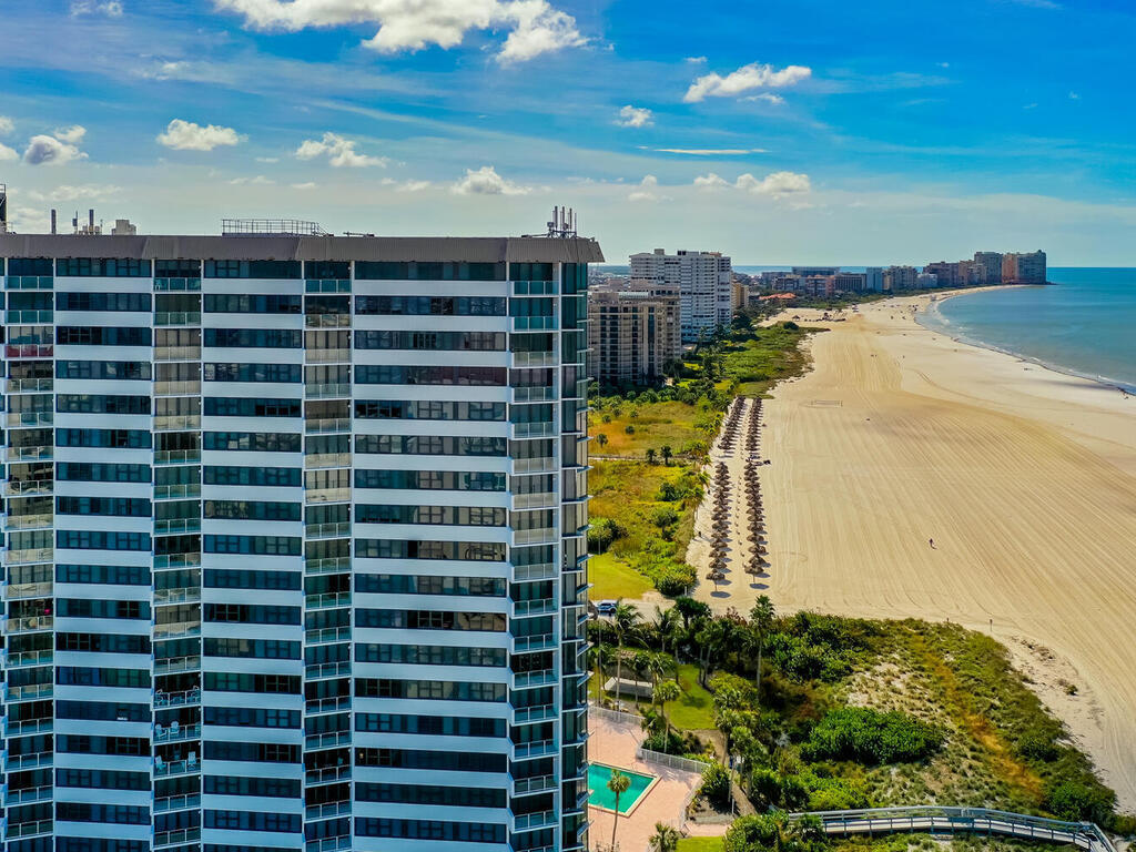 a view of a city with an ocean view