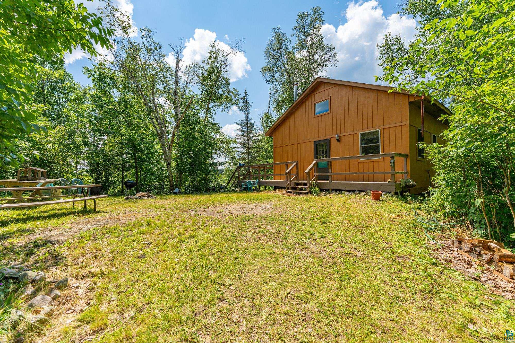 View of yard with a deck