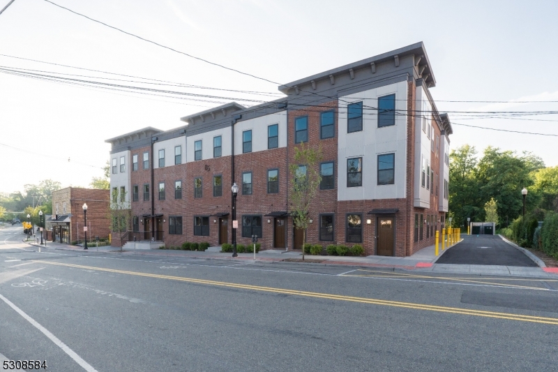 a view of a building and a street